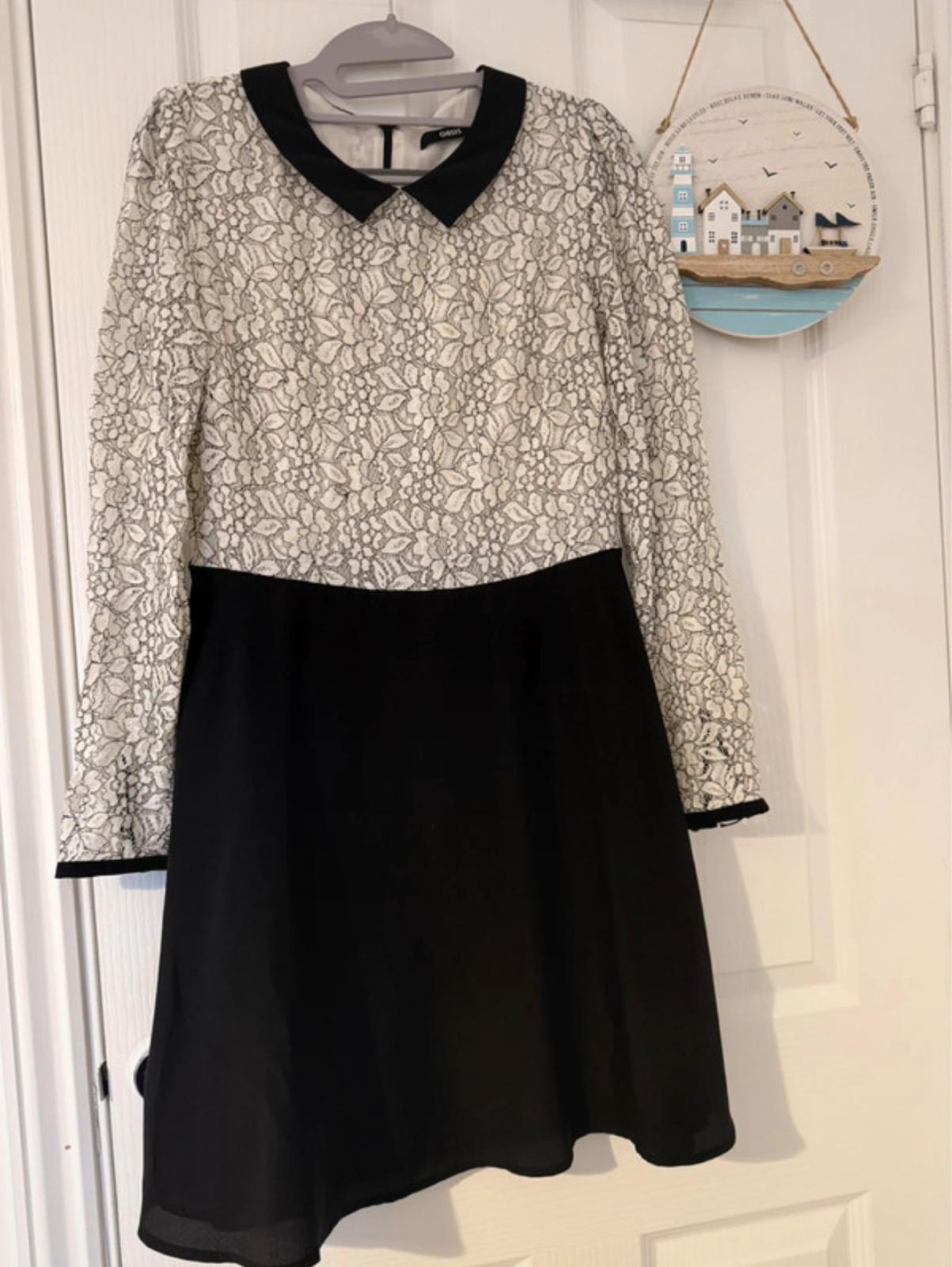 A knee-length lace dress