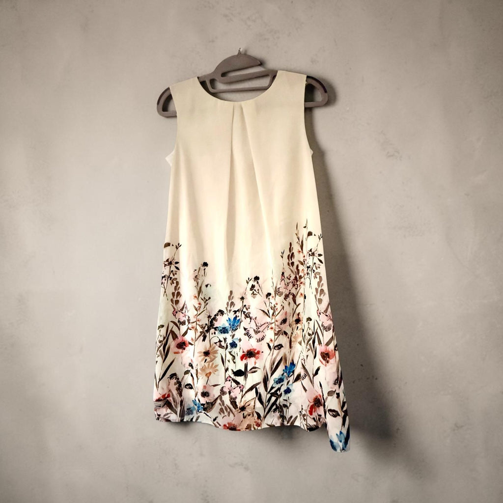 Sleeveless dress with pink jacket